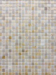 Mosaic tiles texture for background. Small square ceramic tile mosaic beige. Tile wall.