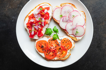 vegetable bruschetta tomato, radish cream cheese on the table cooking meal snack top view copy space food background rustic image 