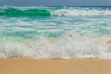 Sea view from tropical beach with sunny sky in Bali.