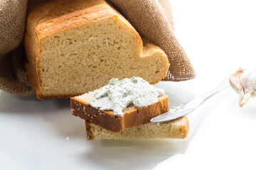 homemade salted curd spread with herbs and garlic