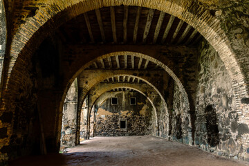 Empty hall of an old ruined castle - 419670332