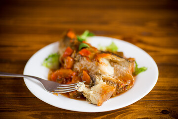 whole fish hake stewed with carrots, beets, peppers and other