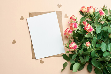 Valentines day card mockup with fresh roses bouquet and small paper hearts