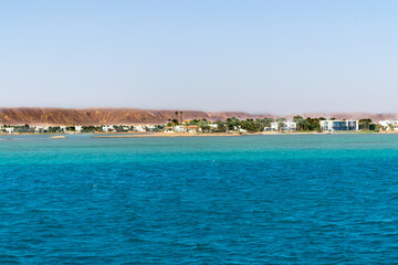 Fototapeta premium Red sea coral reef and blue sky. El Gouna, Egypt