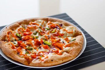 Appetizing pizza close-up. Top view.