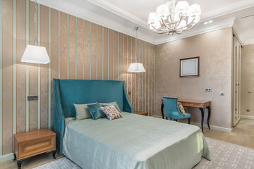 Modern comfortable, nicely decorated, elegant master bedroom. Interior design.