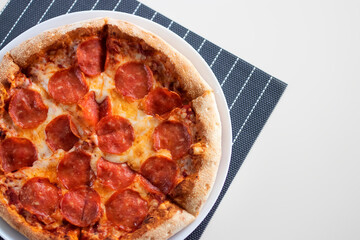 Appetizing pizza pepperoni close-up.