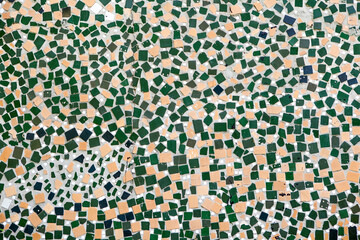 Texture. Color mosaic of tiles on the old wall