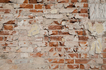 Red old brick wall with cracked surface with cement, no person and background for template