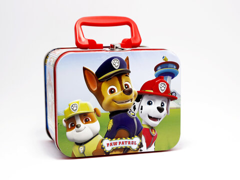 Paw Patrol. Lunch box with the characters from the television series Paw Patrol. Metal box. Dogs Chase, Marshall and Rubble. Isolated. Tv serie. Movies. Pets.