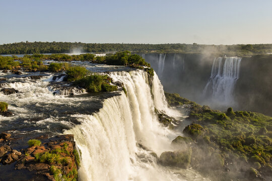 Iguazu Falls seen from above. It is a sunny day with blue sky. Foz do Igua&ccedil;u, Brazil.