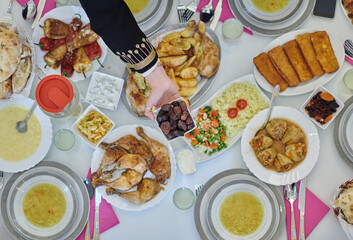 Top view of muslim family having Iftar during Ramadan holy month