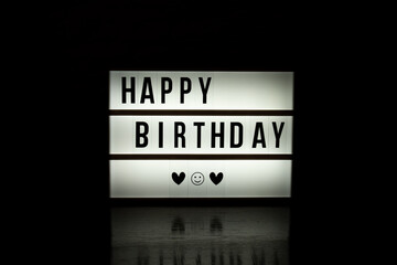 happy birthday sign lightbox dark backgroud