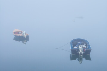 USA, Massachusetts, Cape Ann, Gloucester. Annisquam Harbor, boats in fog