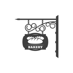 Bakery shop vintage signboard with metal chain and forged ornaments isolated hanging bread store sign. Vector antique bakery signage, fresh buns and loaf, baked food retro black street signboard