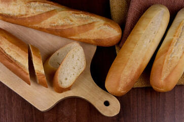 French baguettes on the table top view stock images. Pile of french bread still life stock photo....