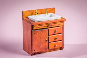 A cabinet from the bathroom of the dollhouse