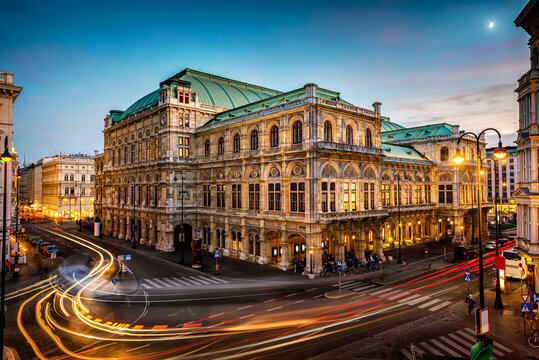 Vienna State Opera. Veinna, Austria. Evening view. The historic opera house is a symbol and landmark of the city of Vienna.  Panoramic view, long exposure.