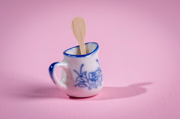 A small dish from a dollhouse with cutlery