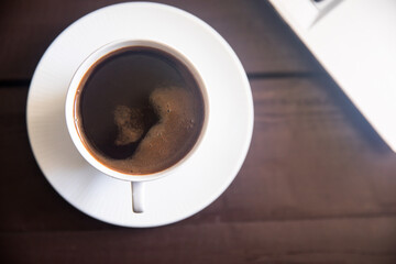 cup of coffe on table