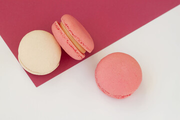 Fresh natural colorful macarons, top view, abstract sweet art, romantic gift. Minimal sweet food concept.