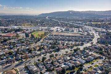 Drone Aerial View Suburban Coastal California Neighborhood. Single Family Homes Near A Park and...