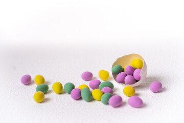 Colorful easter eggs in shell on white background. Background with easter eggs.