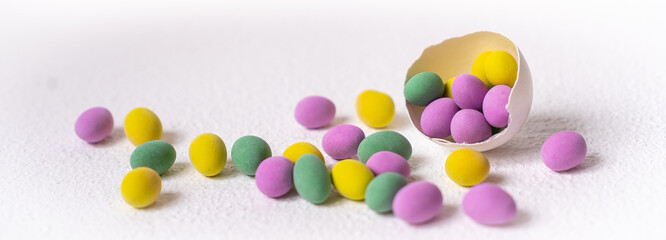 Colorful easter eggs in shell on white background. Background with easter eggs.