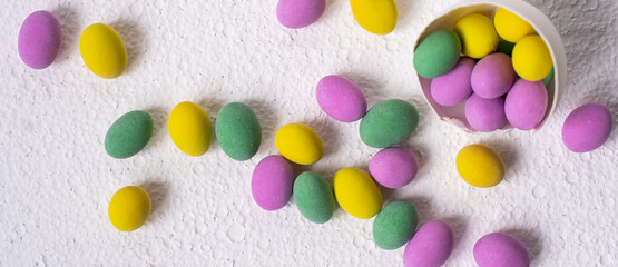 Colorful easter eggs in shell on white background. Background with easter eggs.