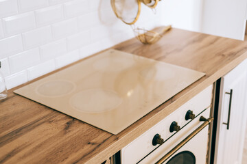Electric stove for cooking in the kitchen, close-up. Modern kitchen detail.