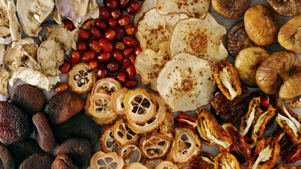 Mix of dried vegetables and fruits flat lay top view in rectangular shape. Background with copy space.