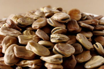 Dried fava beans (Vicia faba) close-up. Vegan protein food.