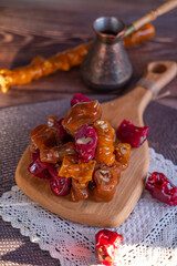oriental sweet with nuts - churchkhela on a wood background