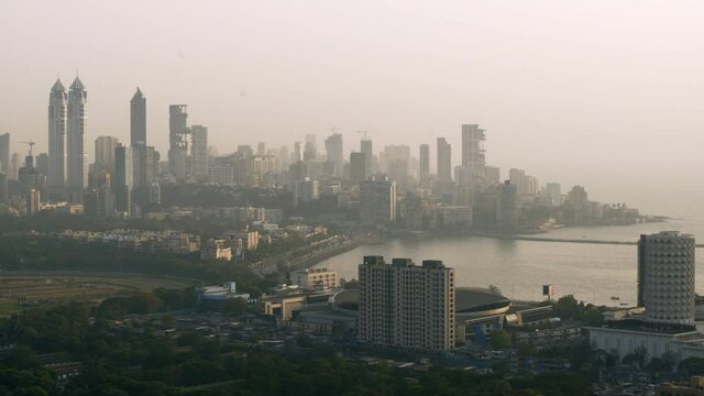Lockdown: Mumbai Harbor With Cityscape At Sunset On Humid Day