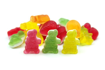 Colourful gummy Easter candies isolated on white background. Fun candy macro shot
