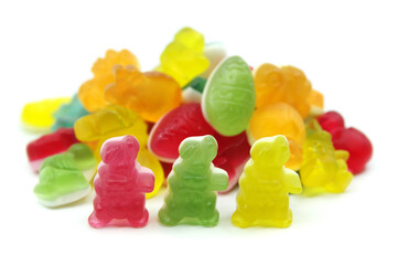Colourful gummy Easter candies isolated on white background. Fun candy macro shot
