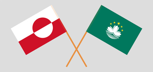 Crossed flags of Greenland and Macau. Official colors. Correct proportion