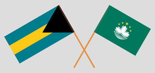 Crossed flags of the Bahamas and Macau. Official colors. Correct proportion