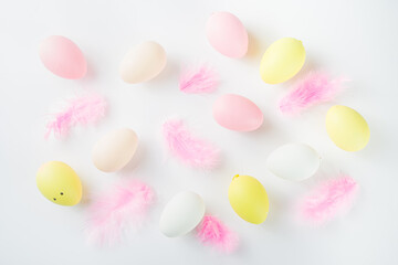 Flatlay of Easter eggs and feathers