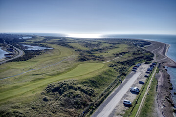 Aerial of Hayling Golf Club a links course on the western tip of Hayling Island and next to the beach sea entrance to Langston Harbour with the Kench nature reserve on the north side.
