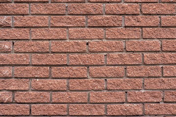 The texture of a brown decorative brick wall, background.