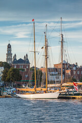 USA, Massachusetts, Cape Ann, Gloucester. Gloucester Schooner Festival, schooners at dusk - obrazy, fototapety, plakaty