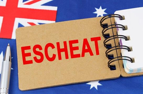 Against the background of the flag of Australia lies a notebook with the inscription - ESCHEAT