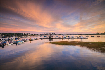 Fototapeta premium USA, Massachusetts, Cape Ann, Gloucester. Annisquam Harbor at sunset.