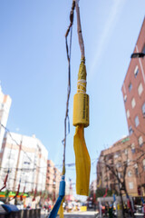 firecracker hanging on a rope in the middle of the street