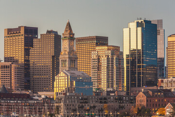 Fototapeta na wymiar USA, Massachusetts, Boston. City skyline from Boston Harbor at dawn.