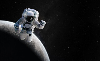 Astronaut spaceman outer space. Elements of this image furnished by NASA.