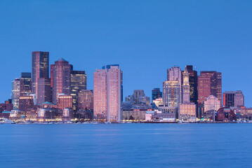 Fototapeta na wymiar USA, Massachusetts, Boston. City skyline from Boston Harbor at dawn.