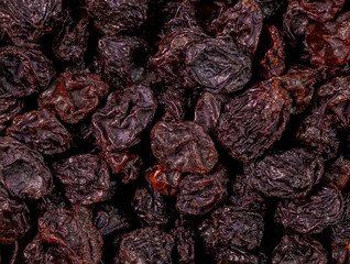 macro shot of dry  black currant from Turkey in detail and with high magnification and very close. Ideal food  and spice dry berry