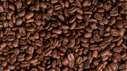 Roasted Coffee Beans Texture background. close-up.